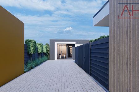 Aanbouw + kapperszaak